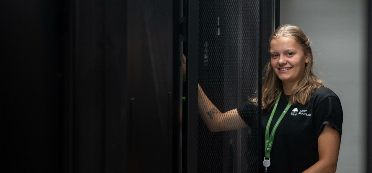 Female technician in data room